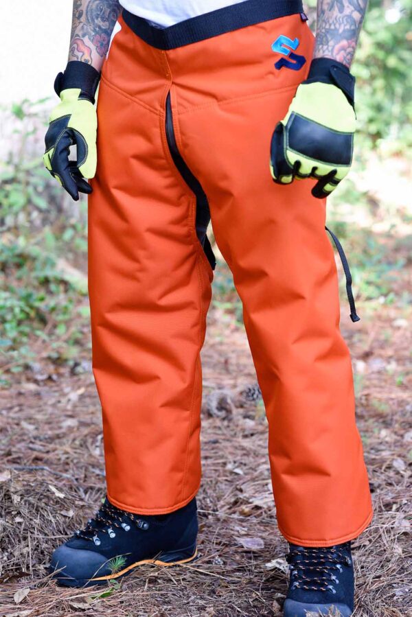 SwedePro Essential Z-Wrap Chap in Orange front view being worn in forest